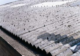Asbestos cement roof (damaged exterior)